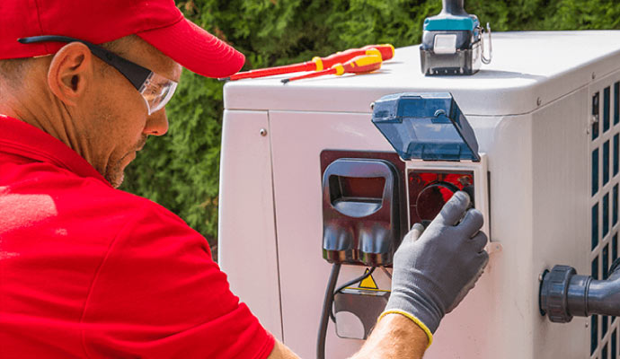 Professional repairing a generator