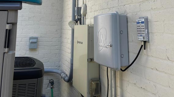 professionals replacing electrical panel