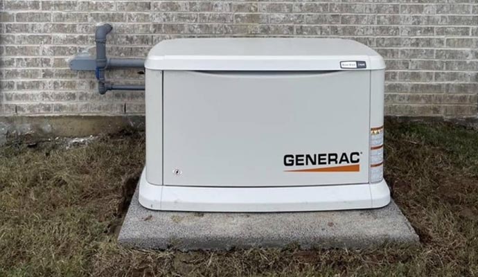 Outdoor generator installed near building