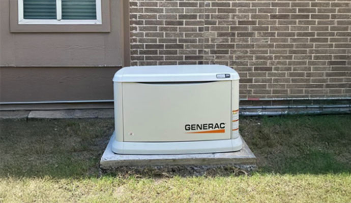 White generac generator installed outside the house